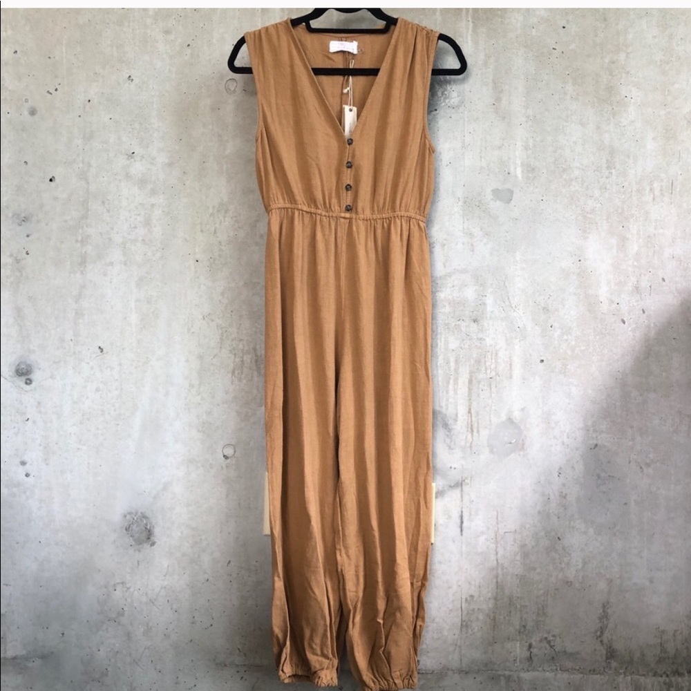 NWT roolee romper. Price is firm.